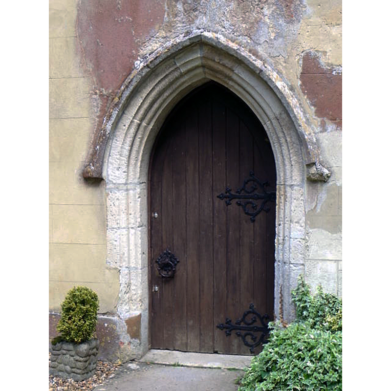 erroneously captioned in the source as "Priests door, St Andrew's Church. This door allows the priest to enter the church without walking through the congregation." [NB: the priest's door opens usually in the south wall and into the chancel; this entranceway, however, opens into the west end of the nave]