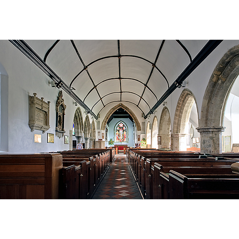 Source caption: "The nave and chancel of St John's church with its C12 and C13 north and south arcades of Purbeck marble. Above is the nave's Waggon Roof with its carved bosses, completed by country craftsmen in the C14."