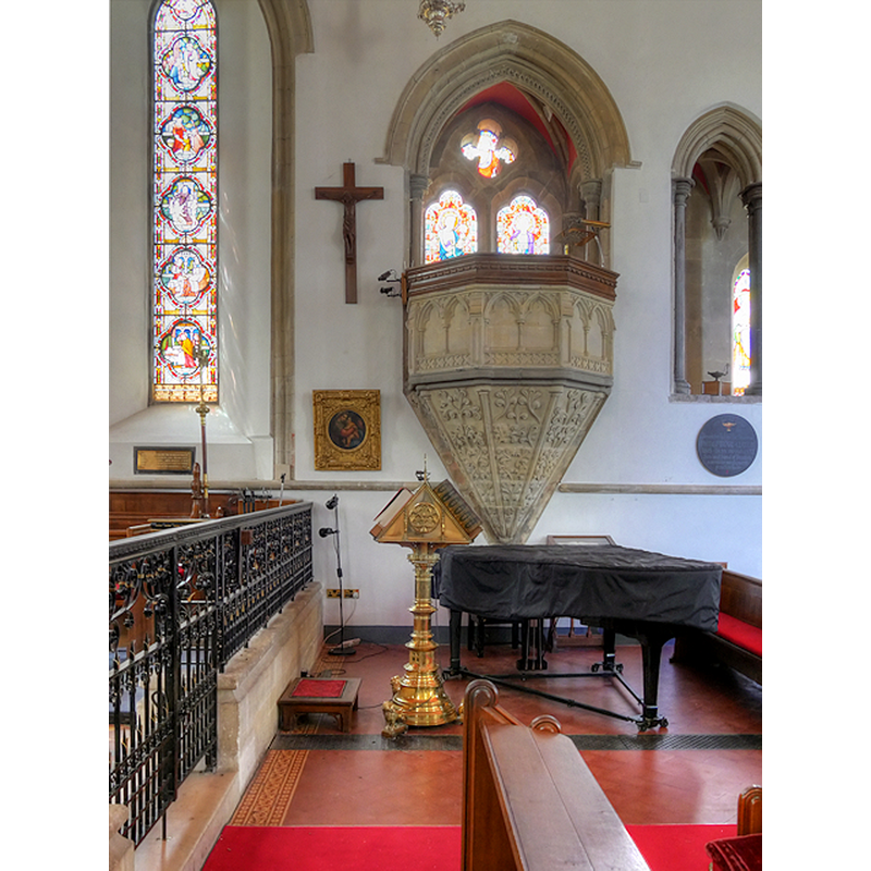 Source caption: "This great stone lectern, now used as a pulpit, [...] is one of only two surviving Cistercian monastic lecterns left in this country (the other is in Chester)"