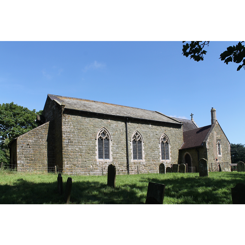 Source caption: "A church possibly existed here before 1153, and during restoration in 1885 traces of a larger church were found. [...] The present church was built in 1791 with a west tower, this was reduced in 1909 to a lean-to porch with a small bellcote over. A vestry was built in 1860 when the chancel was mostly rebuilt."