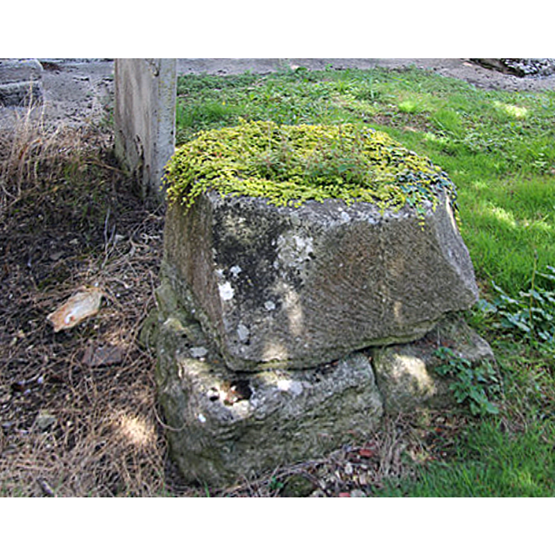 Source caption: "St.Margaret's old font?  Possibly an Early English font bowl by St.Margaret's south porch - or possibly the lower part of a churchyard cross with broaches and a substantial socket for an octagonal shaft ?"