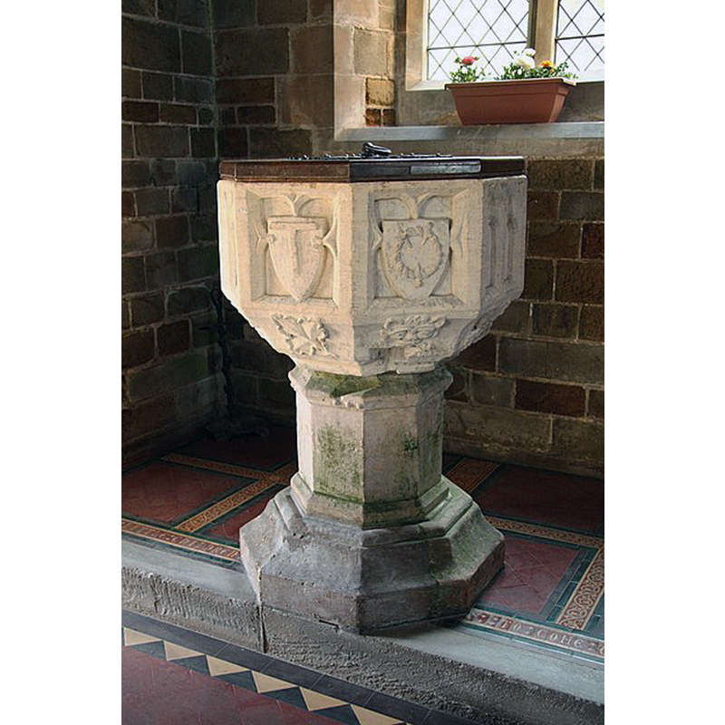 Source caption: "St.Peter & St.Paul's font. Octagonal Perpendicular 15th century font with symbols of the passion on the bowl".