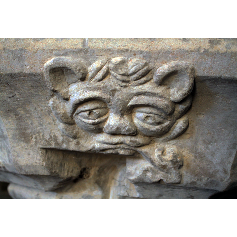 on several of the panels of the underbowl chamfer; this one is on the northeast panel -- notice the damage to the lower part