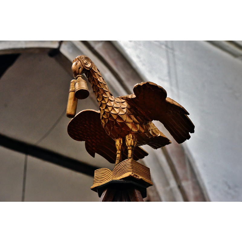 Source caption: "Burgh le Marsh, St. Peter and St. Paul's Church: The gilded bird atop the Jacobean font cover. Holding containers of ink and sand in its beak.".
