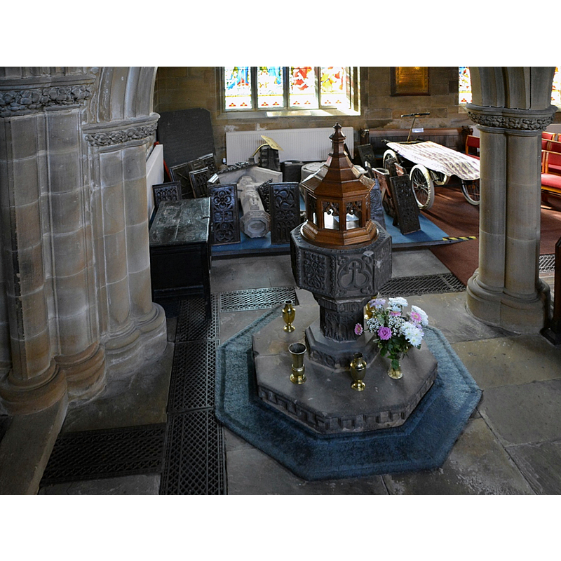 this modern font is located inside Bristall St Peter's, near the sort-of-cemetery of old church remains that includes a medieval font