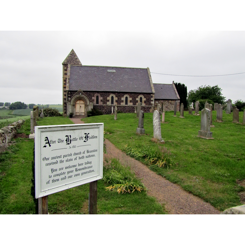 the sign outside the church refers to the Battle of Flodden, of 1513, also known as the Battle of Branxton, which was fought in the vecinity