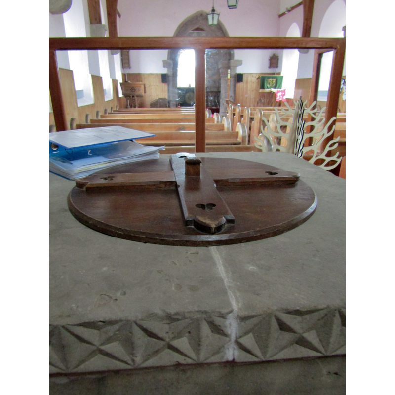phototaken from behind [west side of] the baptismal font