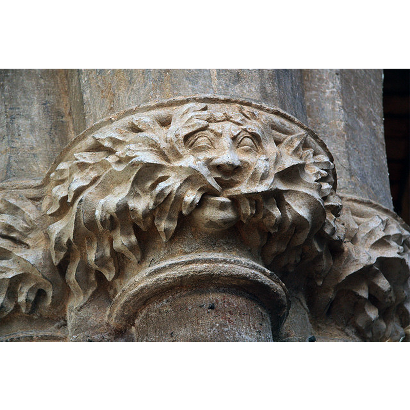 Source caption: :"Green Man. One of several 14th century Green Man capitals in St.Peter's church".