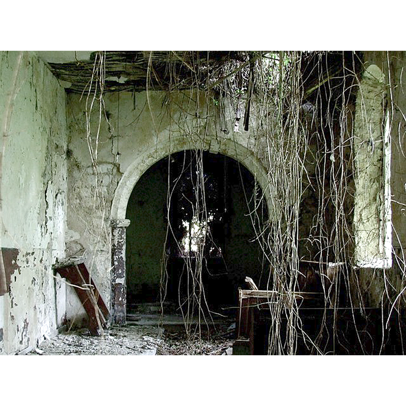 Source caption: "The former Church of St Peter, Low Toynton. This photograph shows the enlarged hole in the roof. If the roof and floor was restored, this could be a substantial building for all sorts of purposes. It appears to have been left to rot since it was sold, in 1977."