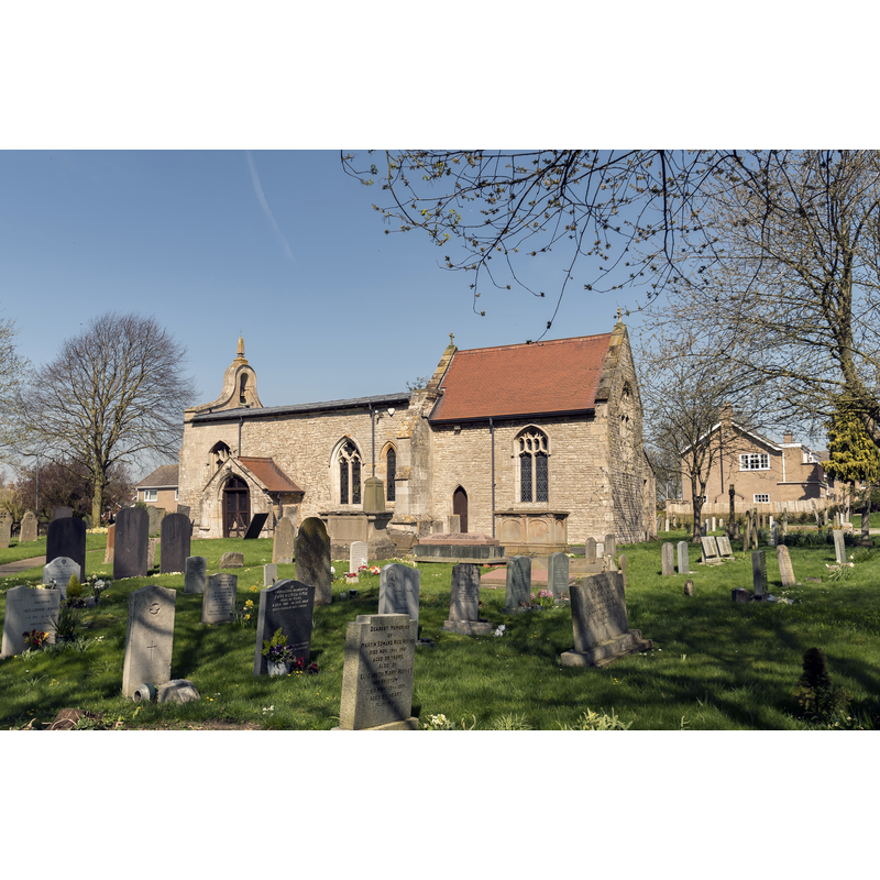 Source caption: "Cranwell, St Andrew's church. The church origins date from the 11th century with some long and short work in the north east angle of the nave. The church consists of a nave with north aisle, chancel, vestry, and south porch. There is no tower, the west end of the nave having a 17th century bellcote. The nave has a Norman four bay north arcade with round arches, and circular piers with scalloped capitals. There are various pieces of a Saxon cross decorated with interlace in the north aisle. Much of the rest of the church was rebuilt during the Early English period. The chancel is perpendicular, rebuilt in 1903. There is an octagonal tub font and a restored wooden screen from the 15th C. The nave and north aisle roof is from the same period. There is a heavily restored 15th C south door. The north aisle was rebuilt in 1812, and there was a restoration by Fowler in 1903-4. The church has several stained glass windows by Bryans."