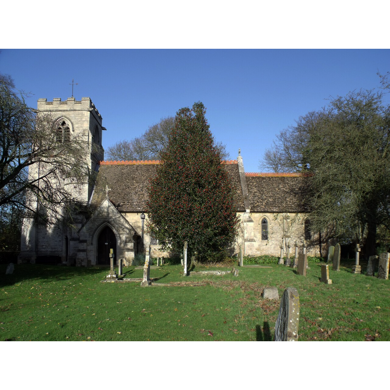 Source caption: "St Peter's Church, Gunby. [...] A small and ancient parish in the deanery of Candleshoe which is mentioned in the Domesday Book.[...] In the reign of Henry III (1216-1272) William de Braytoft held in Burgh, Gunby and Ingoldmells, the fourth part of the fee of one knight of Ketelbron de Keles, who in turn held it directly from the Crown as owner in chief. Robert, Lord Tateshall, William de Weggel and Henry de Stepinge also held lands here at the same time. The church is dedicated in honour of St Peter, the present building being erected in 1865 by R. Coad, on the site of a former church. The church is next to Gunby Hall which is owned by the National Trust however the church is not owned by them. Info from Church Guide leaflet."