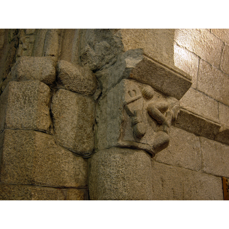 the damaged (?) capital is missing the musician's body