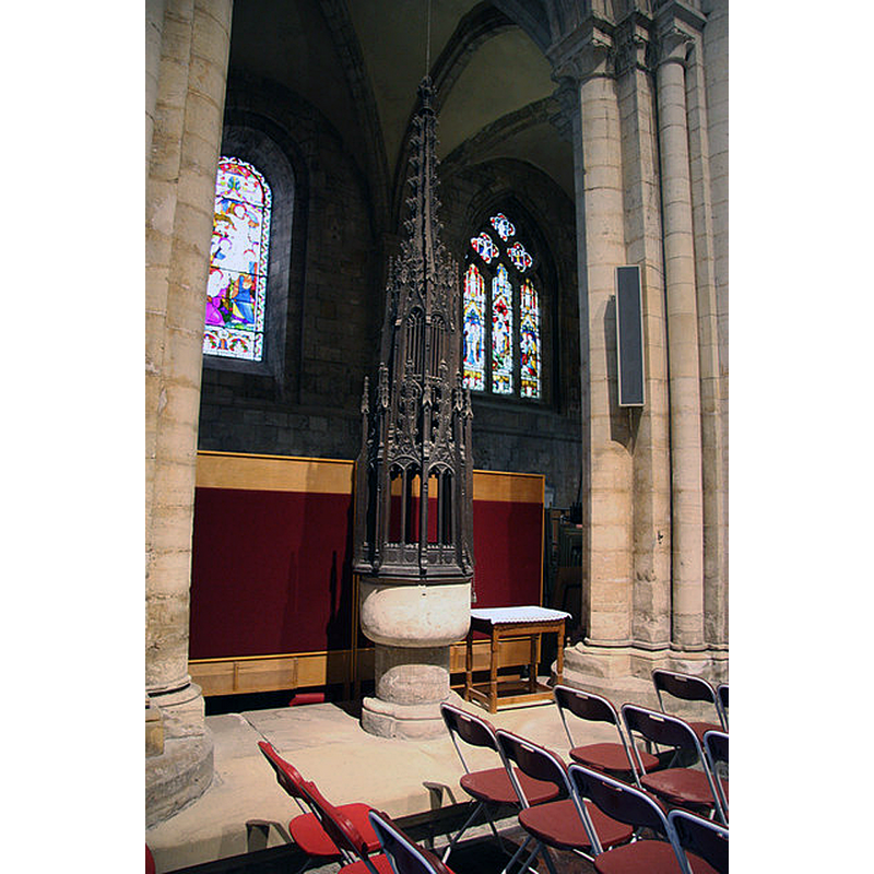 Source caption: "Selby Abbey font. A marked contrast between the plain 12th century Norman tub font and the elaborate richly carved 15th century cover, a lucky survival from the 1906 fire."
