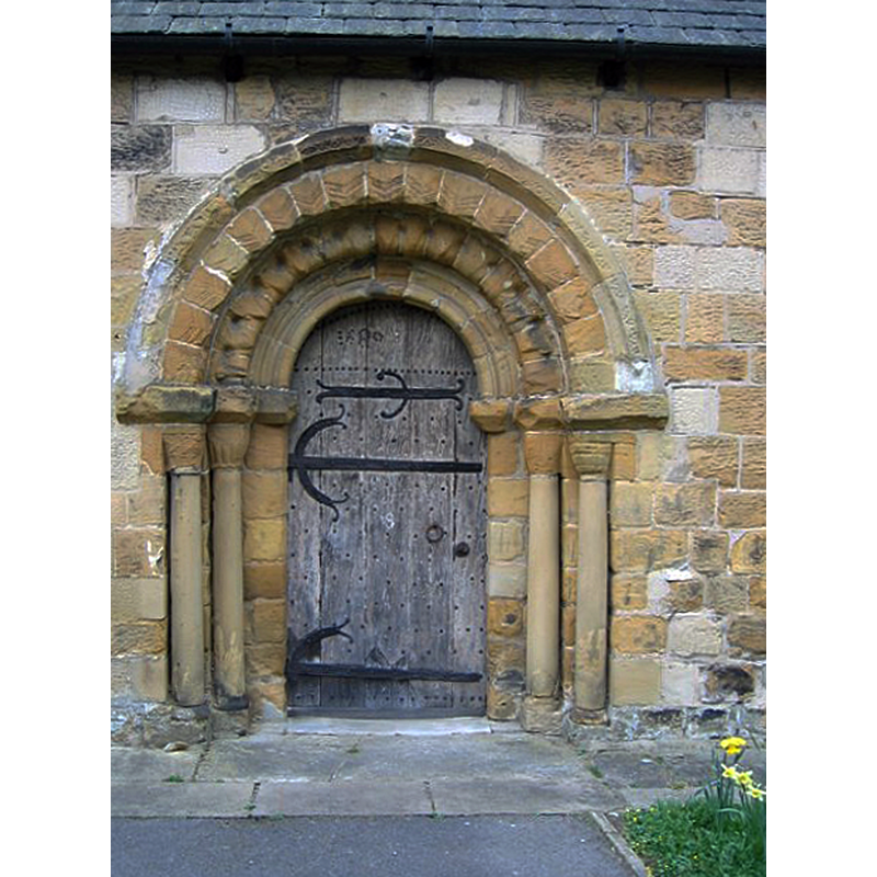 Source caption: "The south wall and doorway of St Oswalds, Sowerby date to the Norman period. The door and metal work are medieval, and the date of 1680 is formed by studs set into the top of the door."