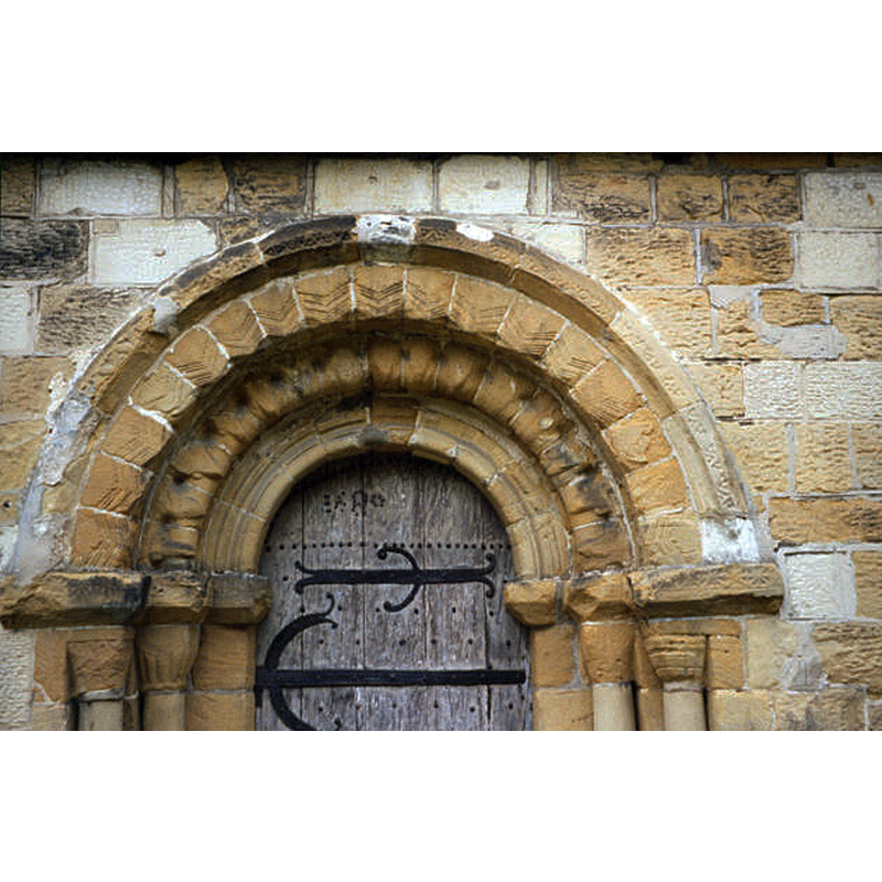 Source caption: "Norman church door, St Oswald's Sowerby. Allegedly one of the best preserved carved Norman doorways of any English church."