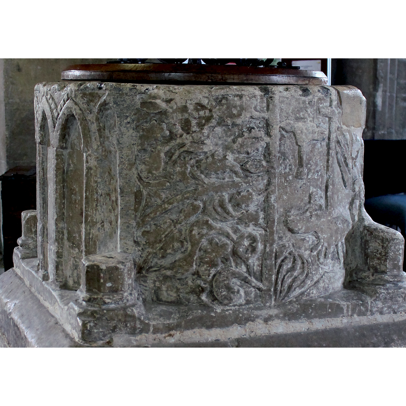 perhaps two: one between the foliage, the other above the Agnus Dei, on the upper left