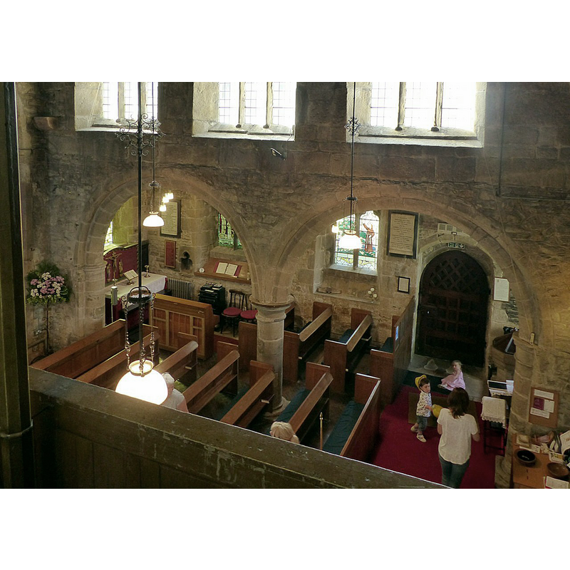 Source caption: "Church of St Mary, Denby. South aisle arcade, looking down from the gallery. Transitional, mid to late 12th century." -- The medieval font stands by the south entranceway, on the right [west]