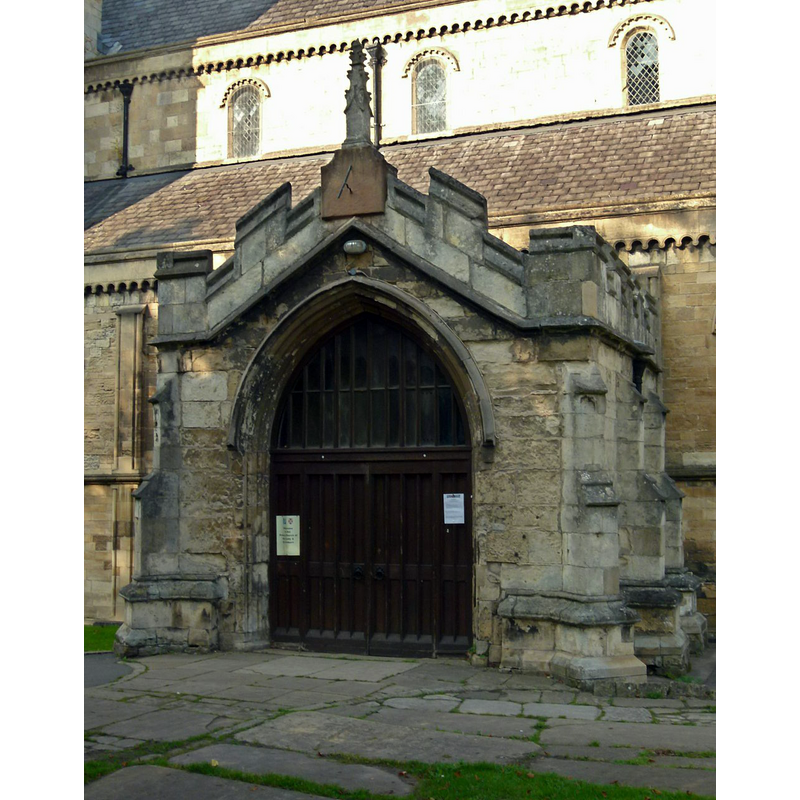 Source caption: "Worksop Priory, south porch. Added to the Norman church in the 13th century."