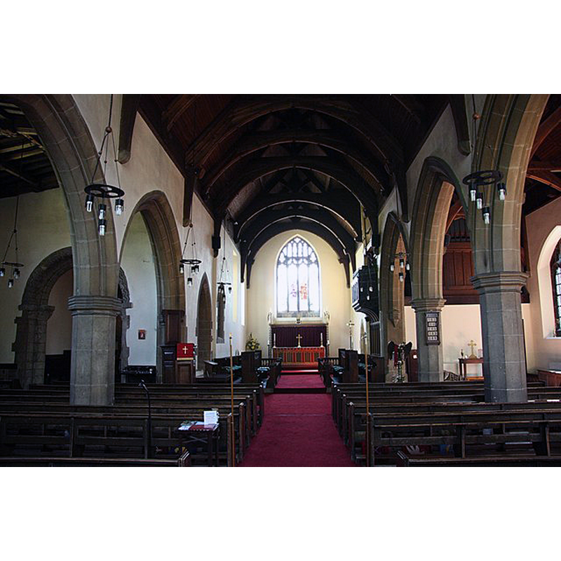 Source caption: "St.John's nave. The rapid population growth of Wales in the 19th century outgrew the small Norman church and two aisles were added to the south in 1897 forming a new nave, seen here looking east".