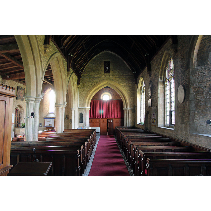showing the font in the south aisle, by the south entranceway