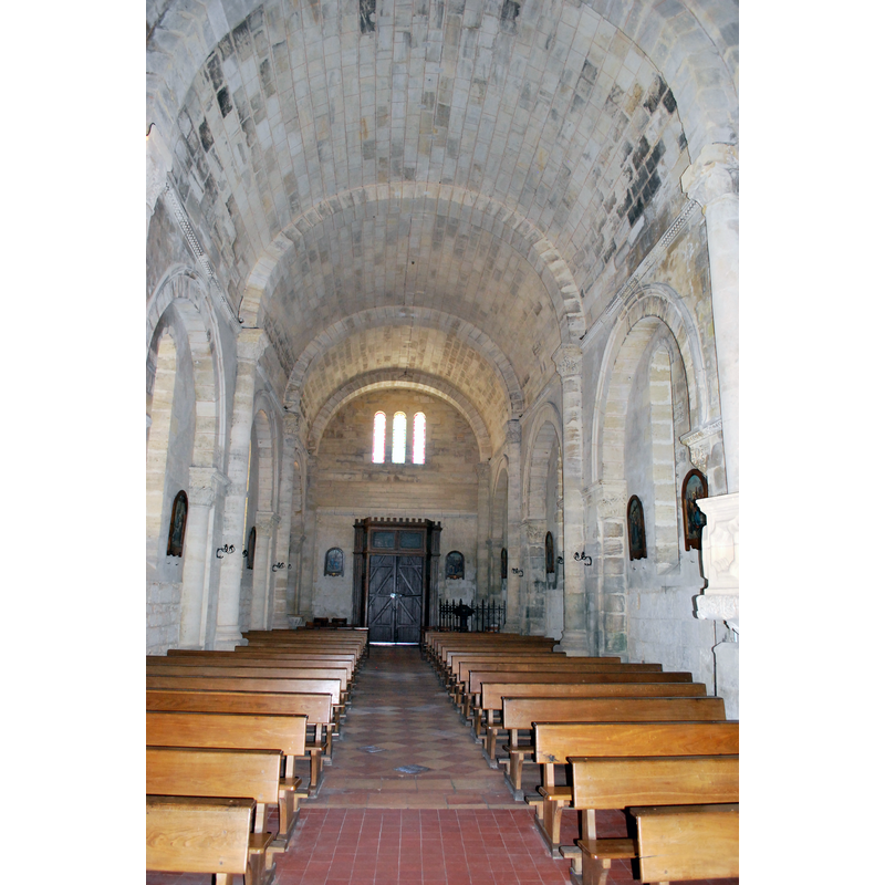 the baptismal font is located at the far [west] end, right [north] side