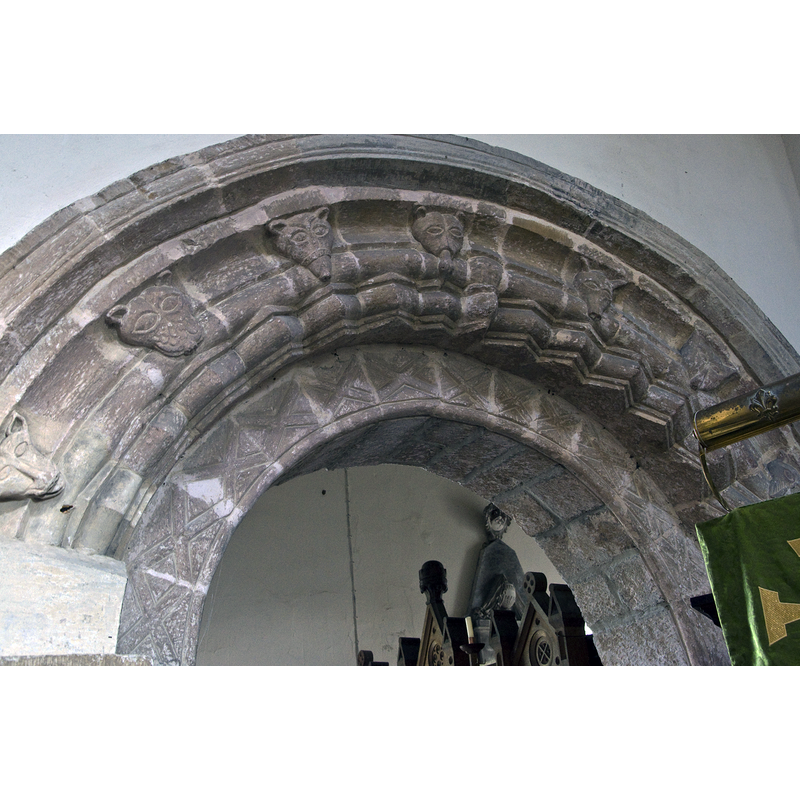 easternmost arch of the north arcade of the nave -- Source caption: "This arch, with its carvings of animal heads, is just one of the many interesting features in St Mary's church."