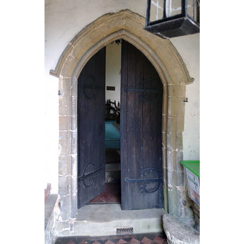 Source caption: "Church of St.Medard & St.Gildard : Inside the porch. The main door, a rather plain affair compared to the other two in the Church."