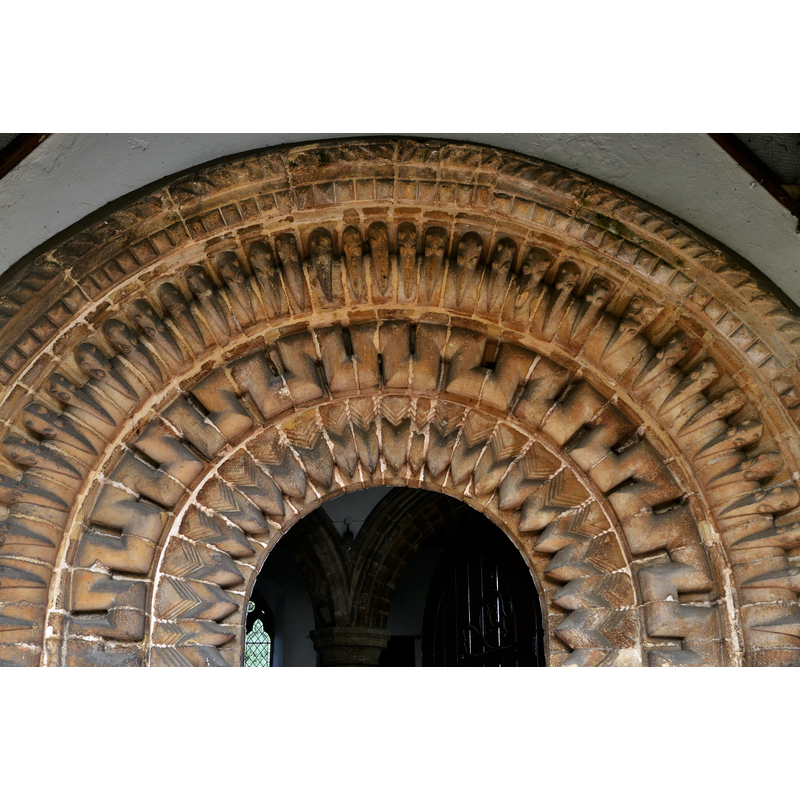 Source caption: "Middle Rasen, St. Peter's Church: The Norman doorway. Comprising zigzag, crenellation and beakhead carvings."