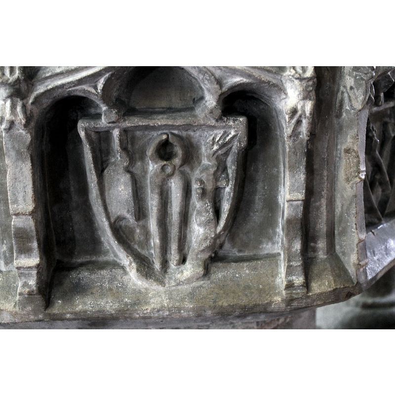 Source caption: "Font Detail, St John the Baptist church, Morton. 15th Century pliers." -- the pincers in the centre; what are the others? the seamless robe on the left?