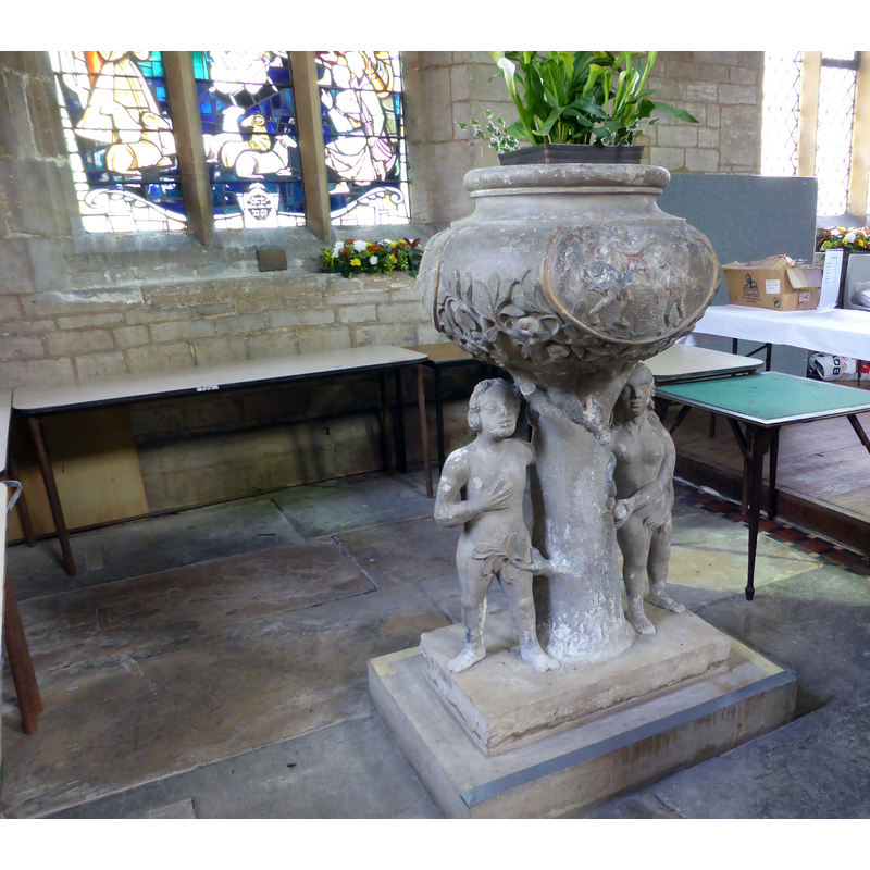 Source caption: "Church of All Saints: The "Adam and Eve" font"