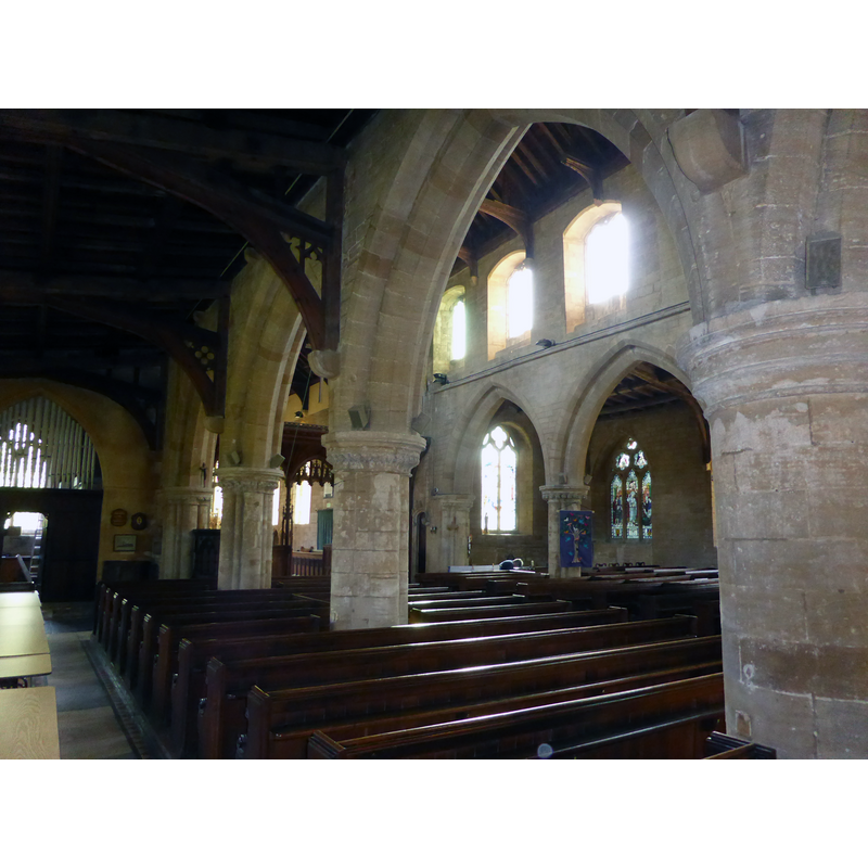 Source caption: "Church of All Saints: The Arcades. Standing in the North Aisle, looking through the North Arcade to the South Arcade, lit by the Clerestory above".