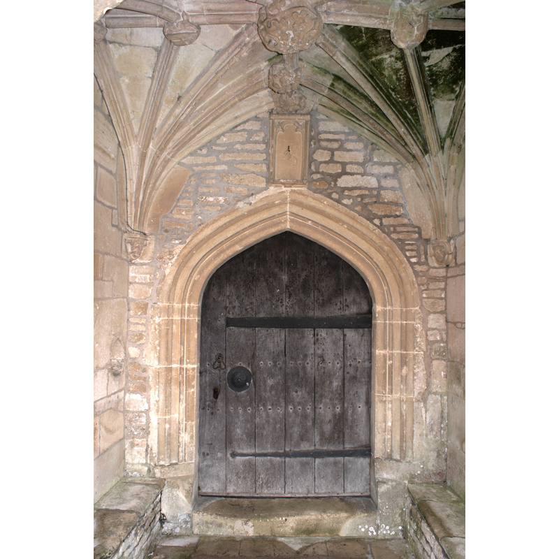 Source caption: "The rich 15th Century (Perpendicular) (1460) vaulting of the north porch of the 12 - 15th Century Church of St. Mary's, Burton/ Nettleton, 03/14. Thr door, handle and escutcheon are original. The key is a foot long! A Stoup for Holy Water is on the left wall."
