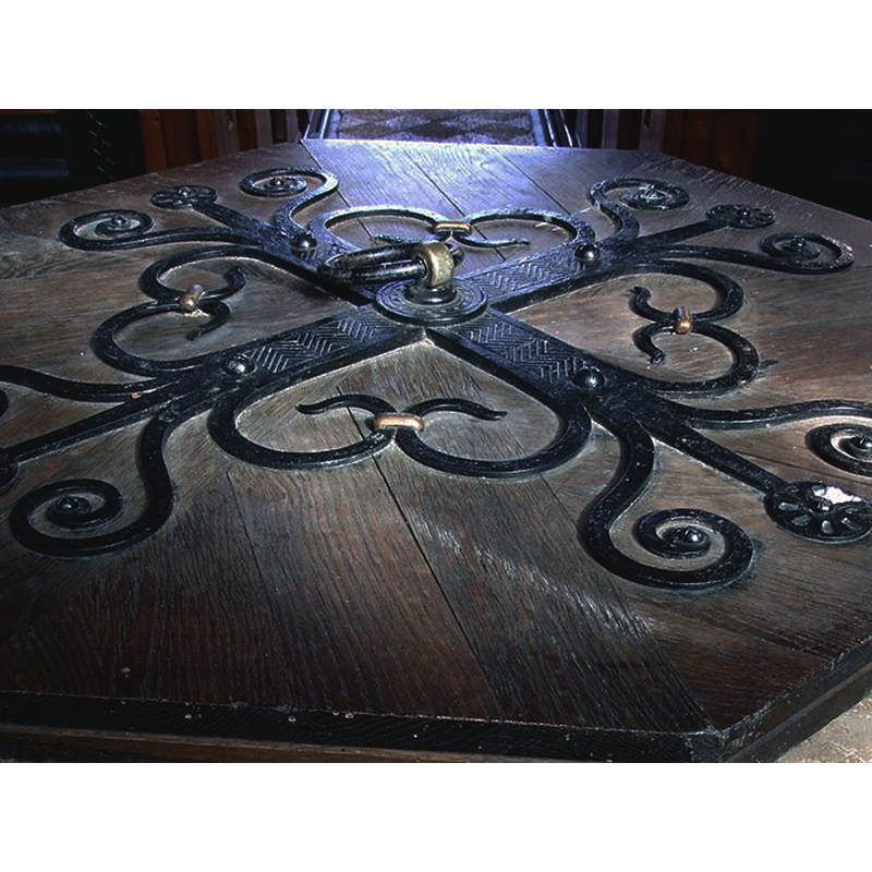 Source caption: "Interior of the Church of St Peter & St Paul, Old Bolingbroke. The heavy oak lid of the baptismal font."