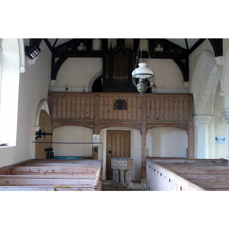 with the 13thC font at the west end, beneath the gallery