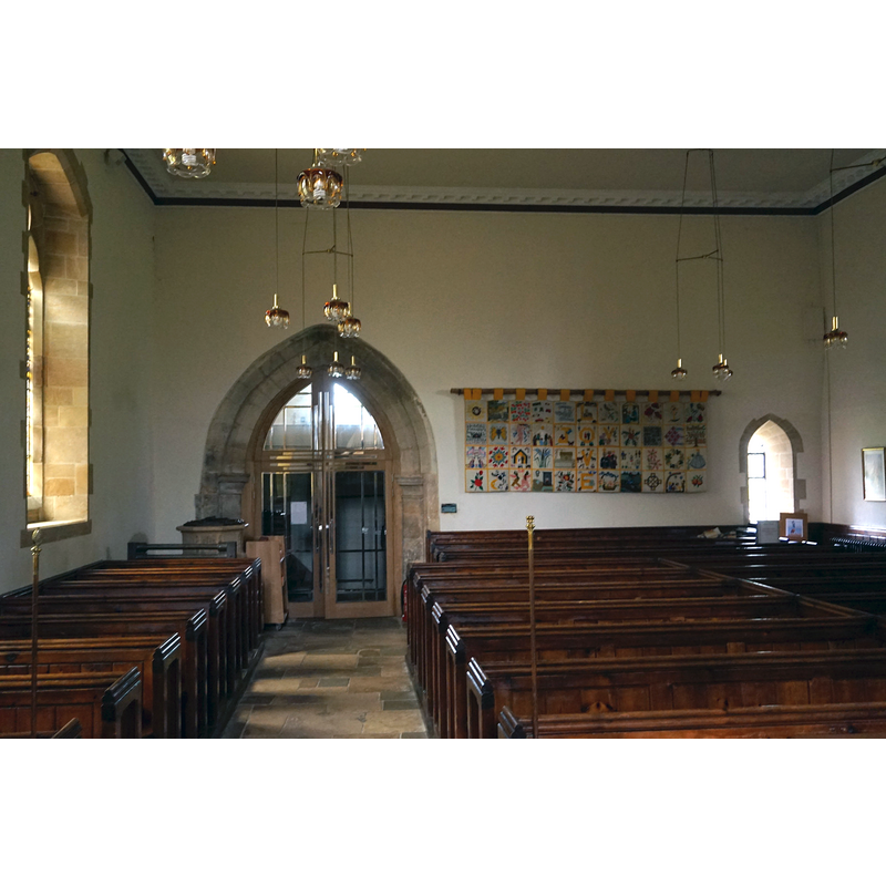 the modern font and its cover are partially visile in the far left cormer, just east of the ca.1200 tower arch