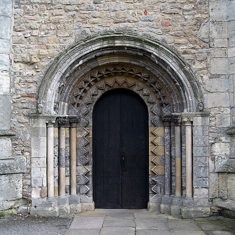 originally the Norman south portal, re-built on the west side of the tower in 1831