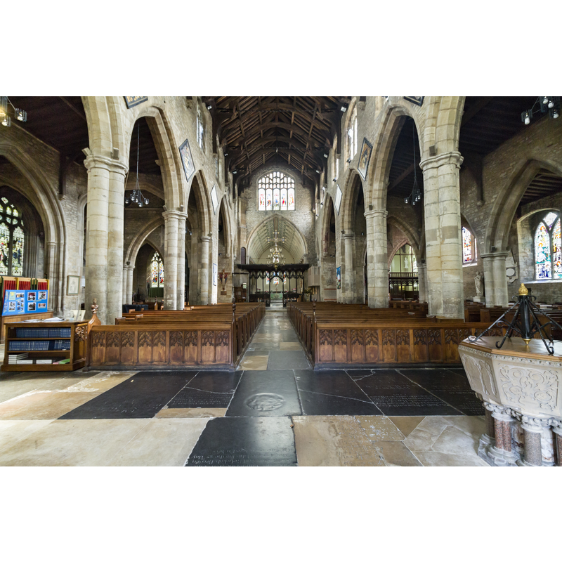 the modern font by Sir G.G. Scott is partially visible at the right