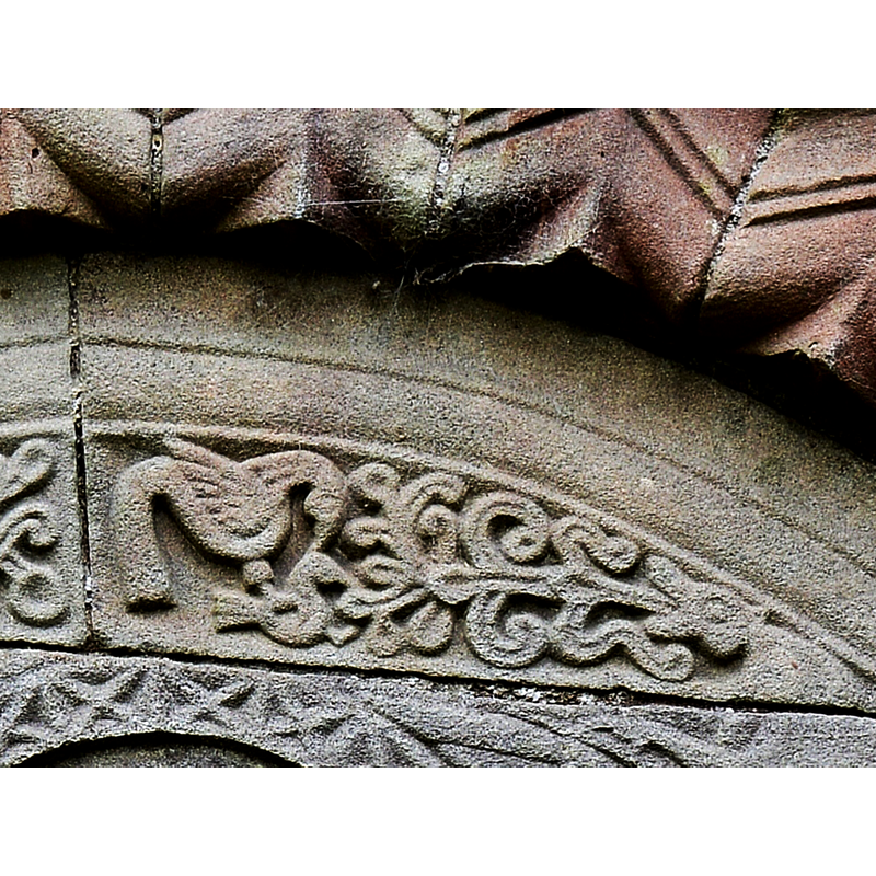 a very similar pair of birds appear on the baptismal font at Stottendon church