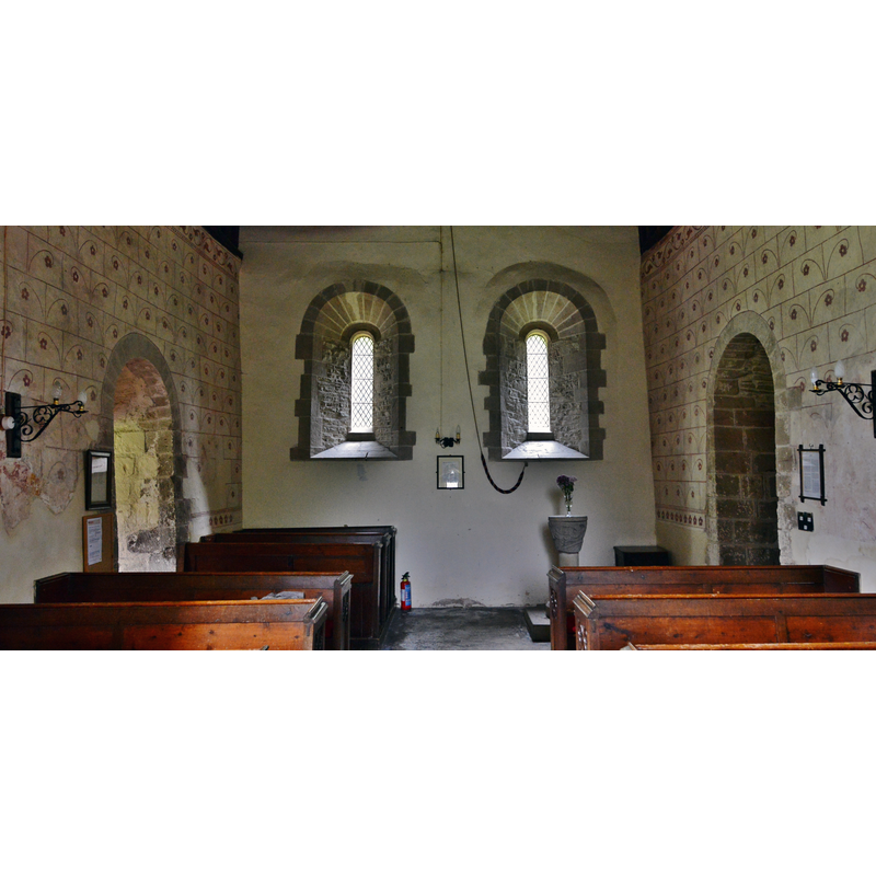 Source caption: "Pipe Aston, St. Giles' church: The nave from the east. The two windows are modern." -- the baptismal font is partially visible at the far back, right side