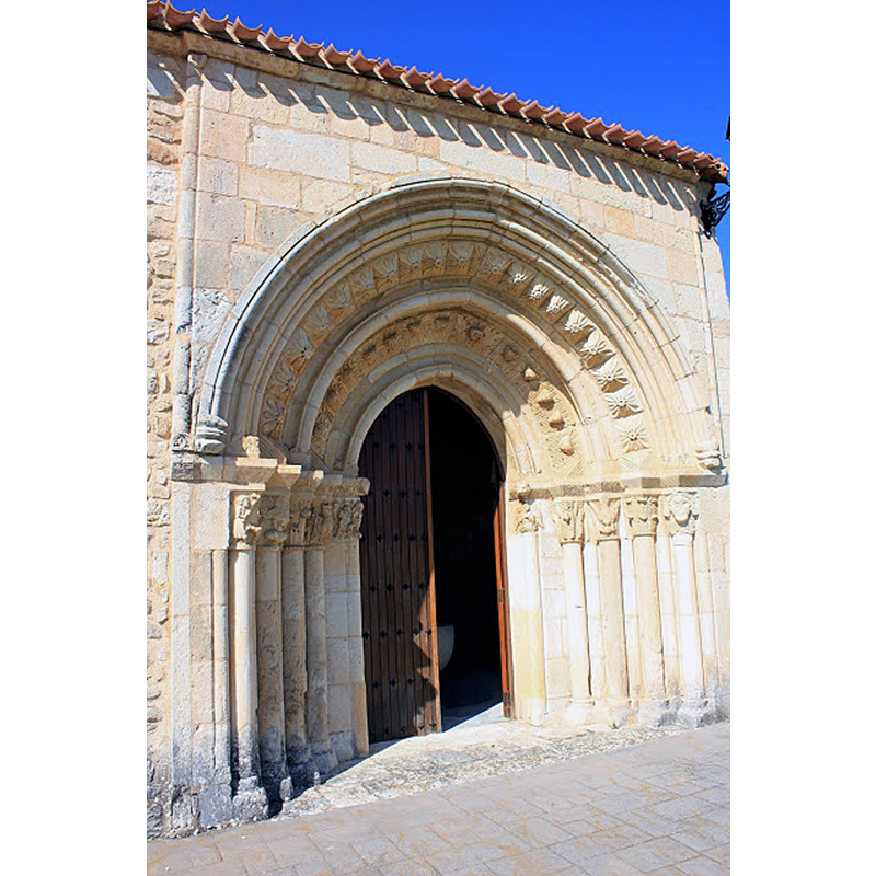 through the open door of the transported portal from Ochate is a partial view of the font in the Uzquiano church