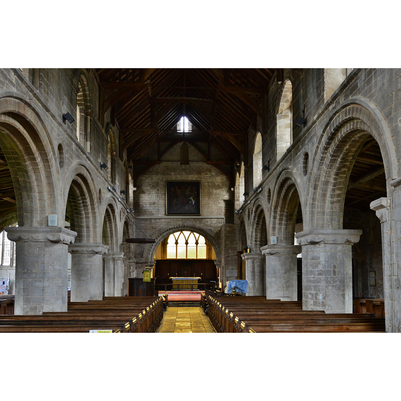 Source caption: "Whaplode, St. Mary's Church: The nave with massive Norman arcades".