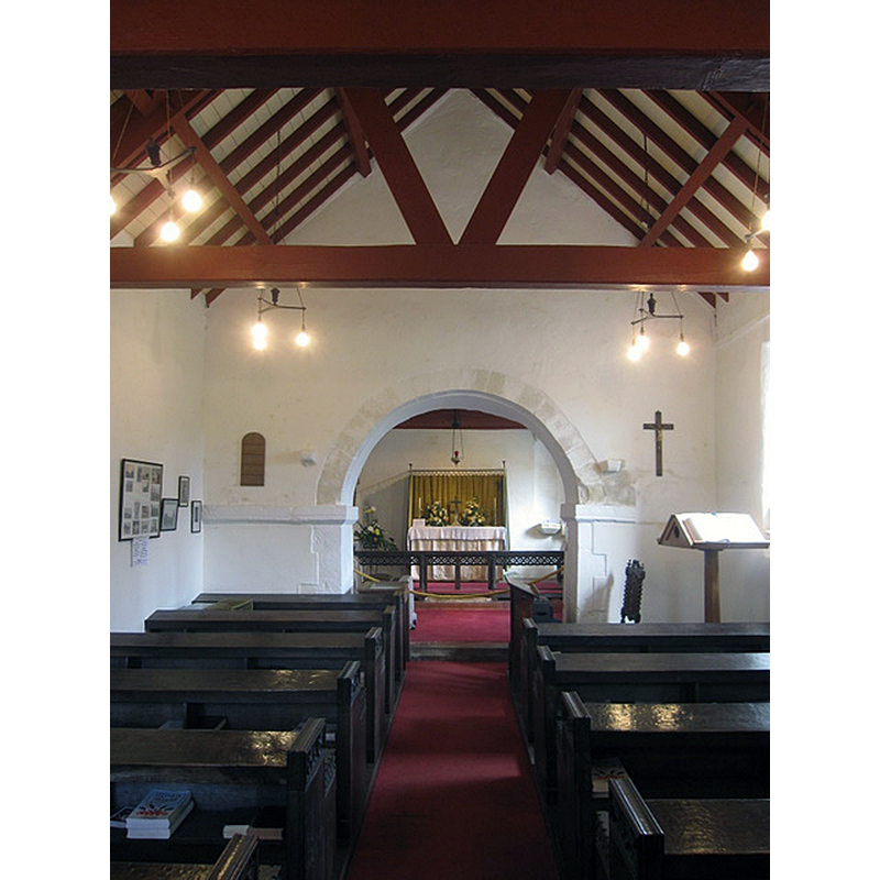 12thC chancel arch -- Source caption: "The nave, St Leonard's, Speeton. Looking east along the nave of St Leonard's, one of the smallest complete parish churches in Yorkshire."
