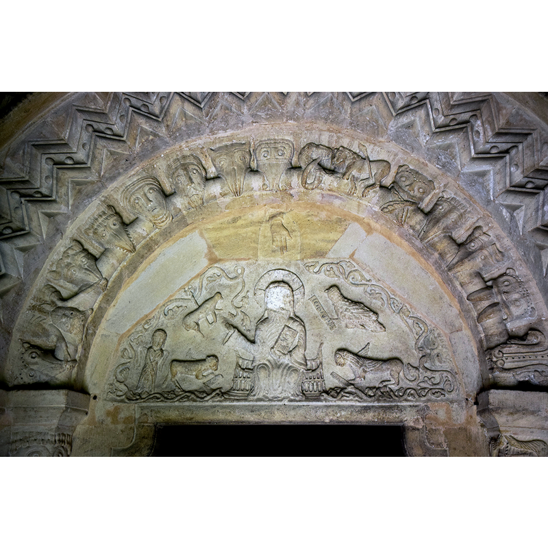 Source caption: "Pictured is the arch and tympanum, showing Christ in Majesty, of the Norman (1160) south doorway."