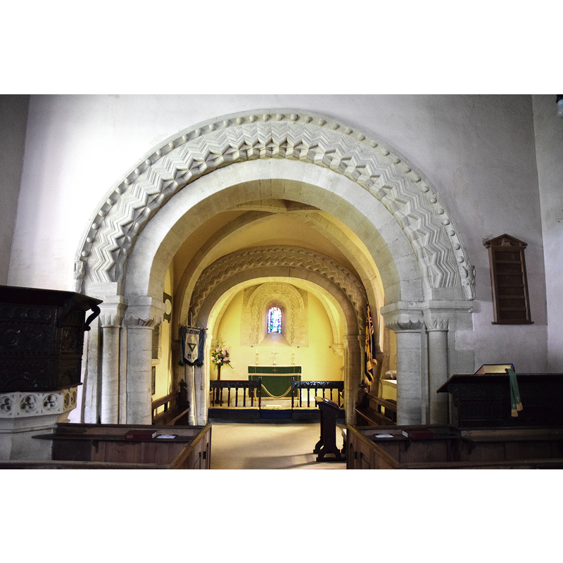 Source caption: "Pictured is the Norman (1160) chancel arches and cross-vaulted bay where the central tower had been located before it collapsed in the 13th Century."