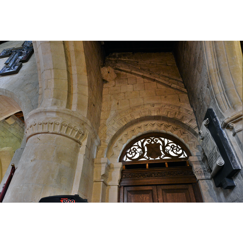 Source caption: "Bishops Cleeve, St. Michael and All Angels Church: The entrance to the Norman south transept".