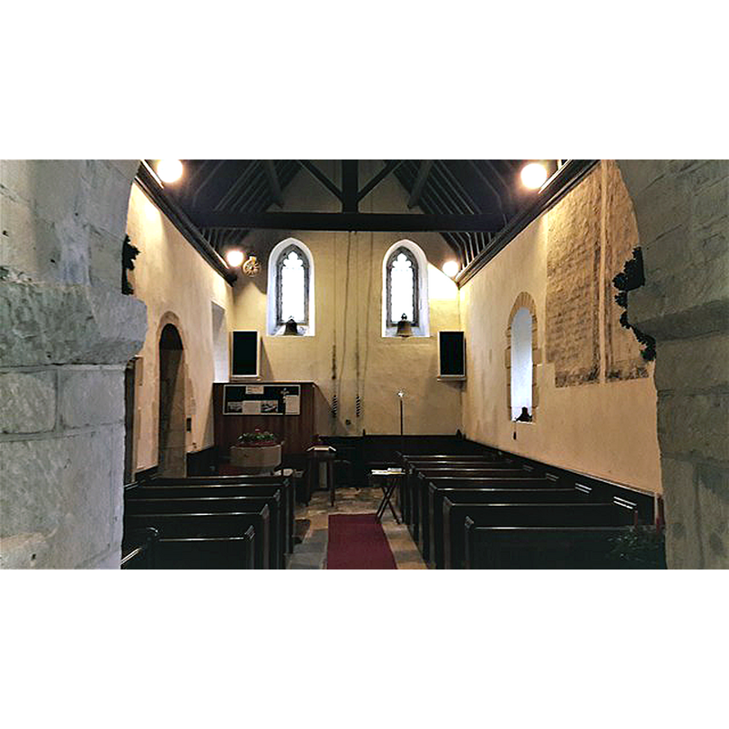Source caption: "St Oswald, Shipton Oliffe. Looking west through the transitional (earliest Gothic) chancel arch. The two windows in the west wall ahead replaced plain 17th century leaded ones during a restoration by H A Prothero of Cheltenham in 1903-4."