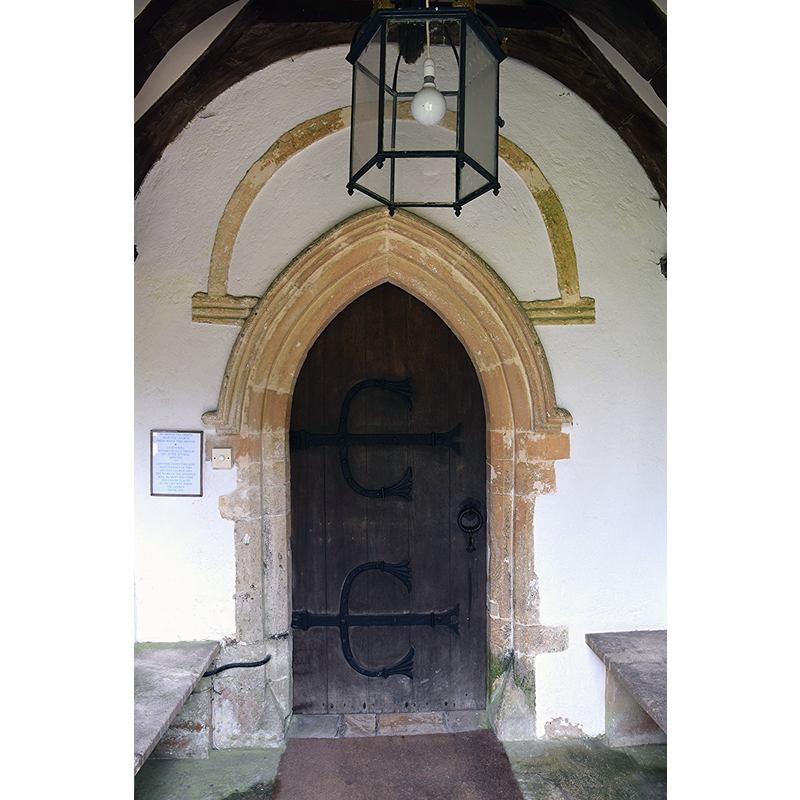 Source caption: "Miserden Church (St. Andrew), 7 September 2016. Pictured is the interior of the early 11th Century Saxon south doorway, altered in the 14th Century when the porch was added, with a new lowered doorway."