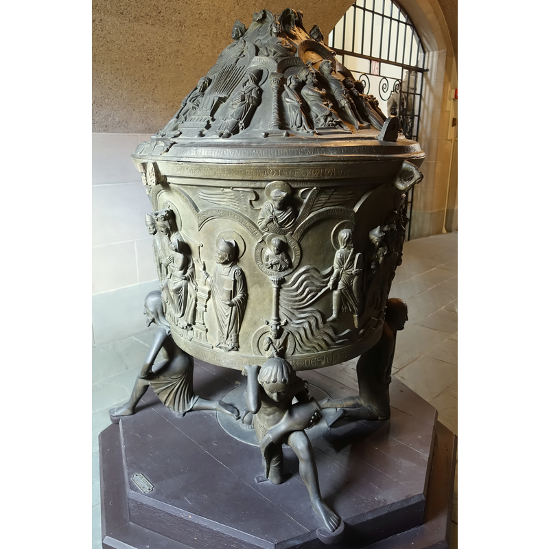 Source caption: "Baptismal font (replica), Hildesheim Cathedral, c. 1225 AD, replica by Gebrüder Kusthardt, c. 1900 AD - Adolphus Busch Hall - Harvard University - Cambridge, Massachusetts, USA"