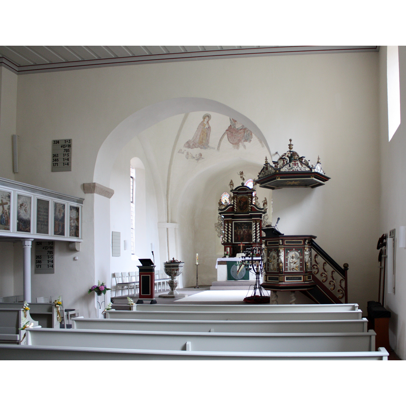 the 1660 baptismal font is visible inside the chancel, on th left [north] side