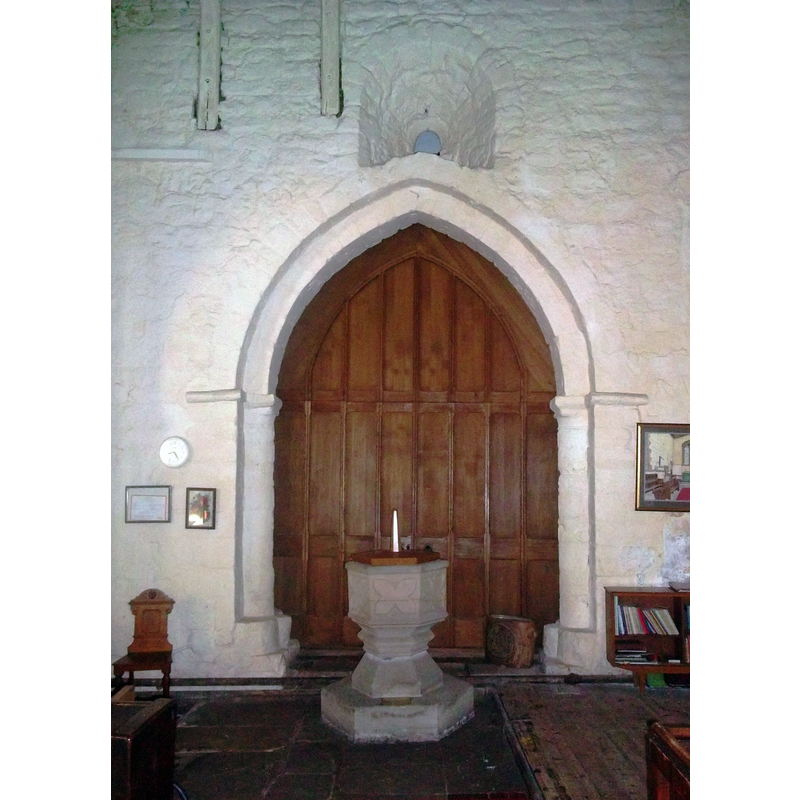 Source caption: "Saxon Window in Mugginton Church. This doorway and deeply splayed window are situated at the western end of the nave in All Saints' Church. The window is 11th Century according to the English Heritage Listing and possibly pre-conquest." -- hexagonal font originally probably 15thC; completely re-cut in the 19thC